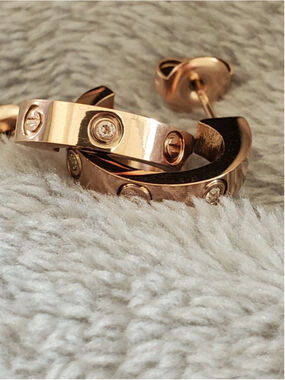 Rose Gold Love Stud Earrings with Diamond like design. 1/2 inches